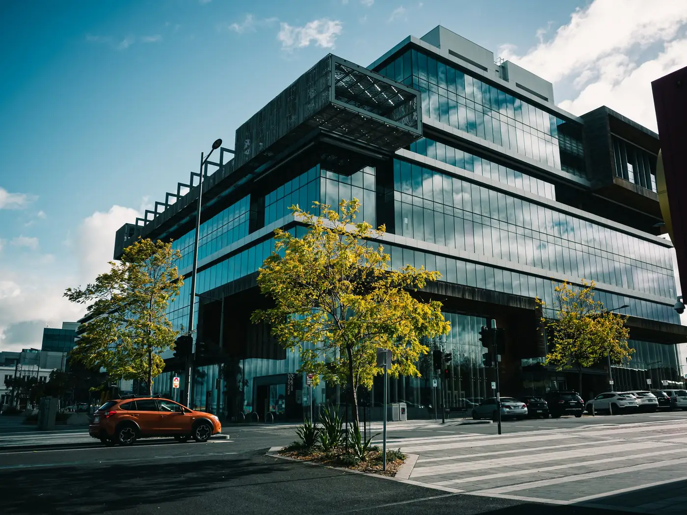 Modern glass-fronted commercial building in Dandenong, Victoria; representative property photograph.